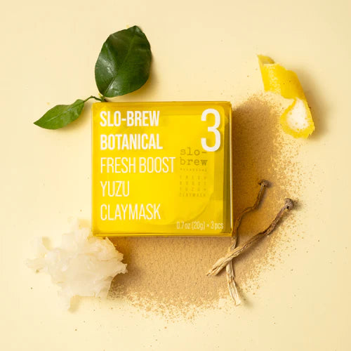 slow-brew botanical yuzu claymask with leaves and roots